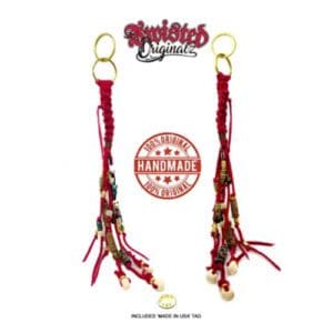A pair of red and gold colored macrame earrings.