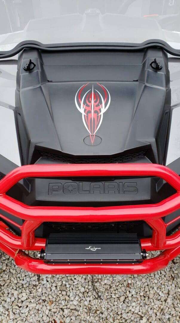 A close up of the front bumper on a polaris vehicle.