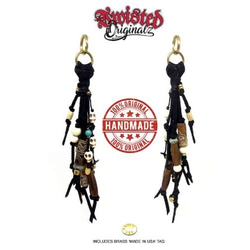 A pair of earrings with spikes and beads.